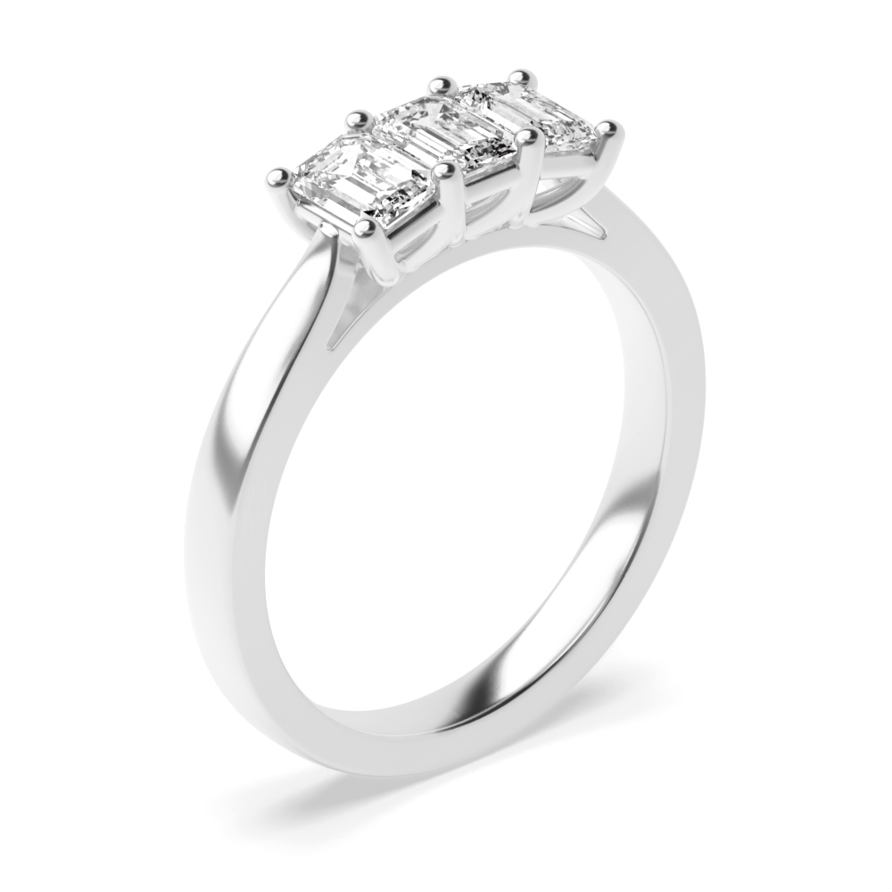4 Prong Set Emerald Cut Trilogy Diamond Rings in Platinum
