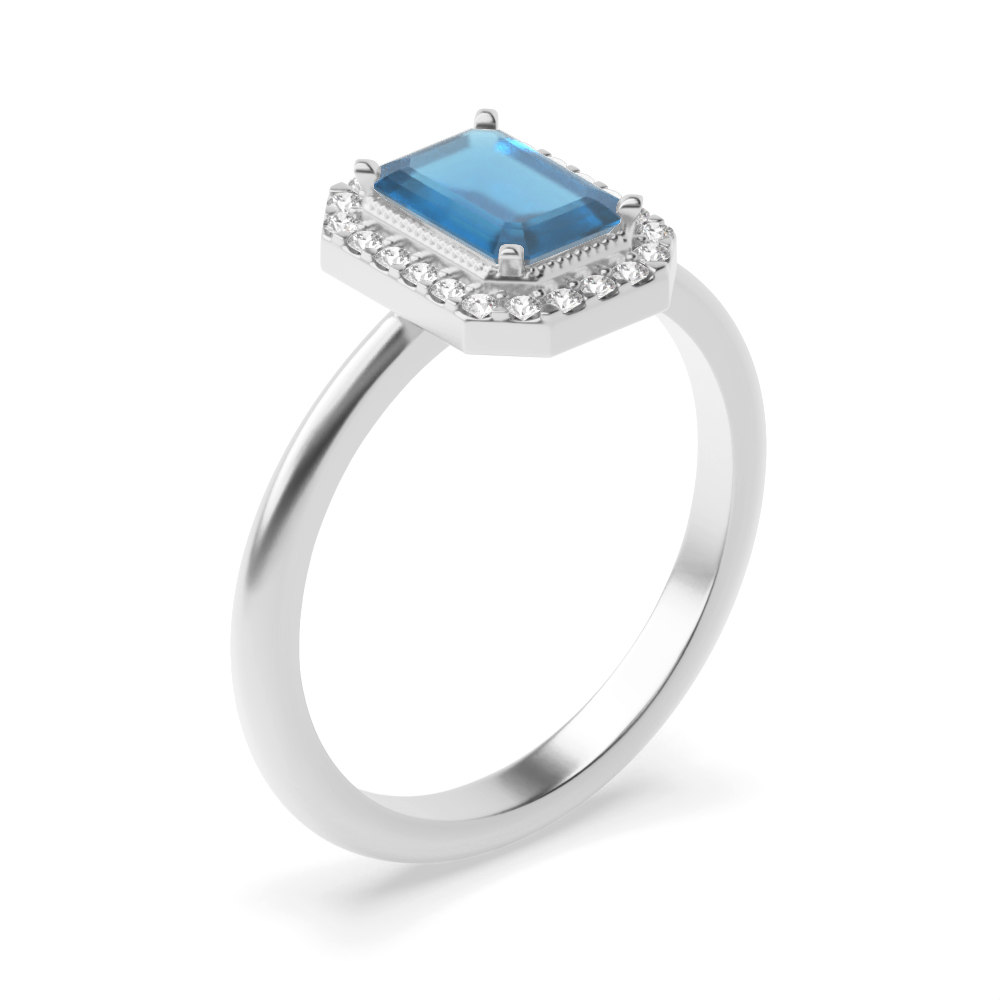 Gemstone Ring With 7X5mm Emerald Shape Blue Topaz and Diamonds