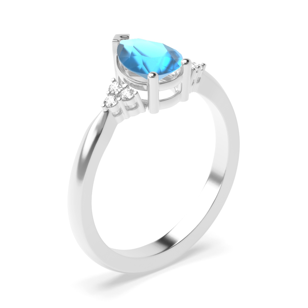 Gemstone Ring With 9X6mm Pear Shape Blue Topaz and Diamonds