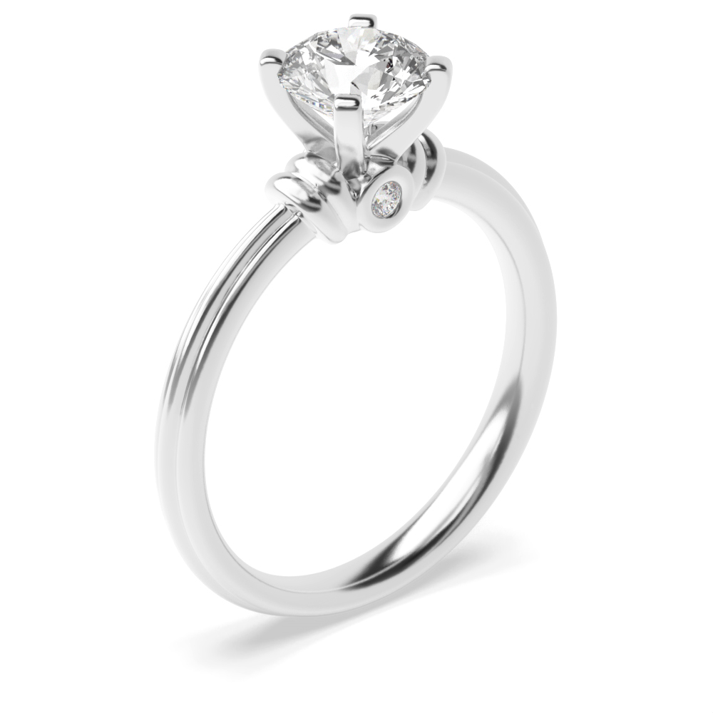 4 prong setting round and side diamond ring