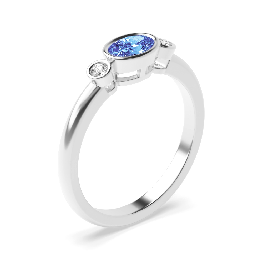6X4mm Oval Tanzanite Three Stone Diamond And Gemstone Engagement Ring