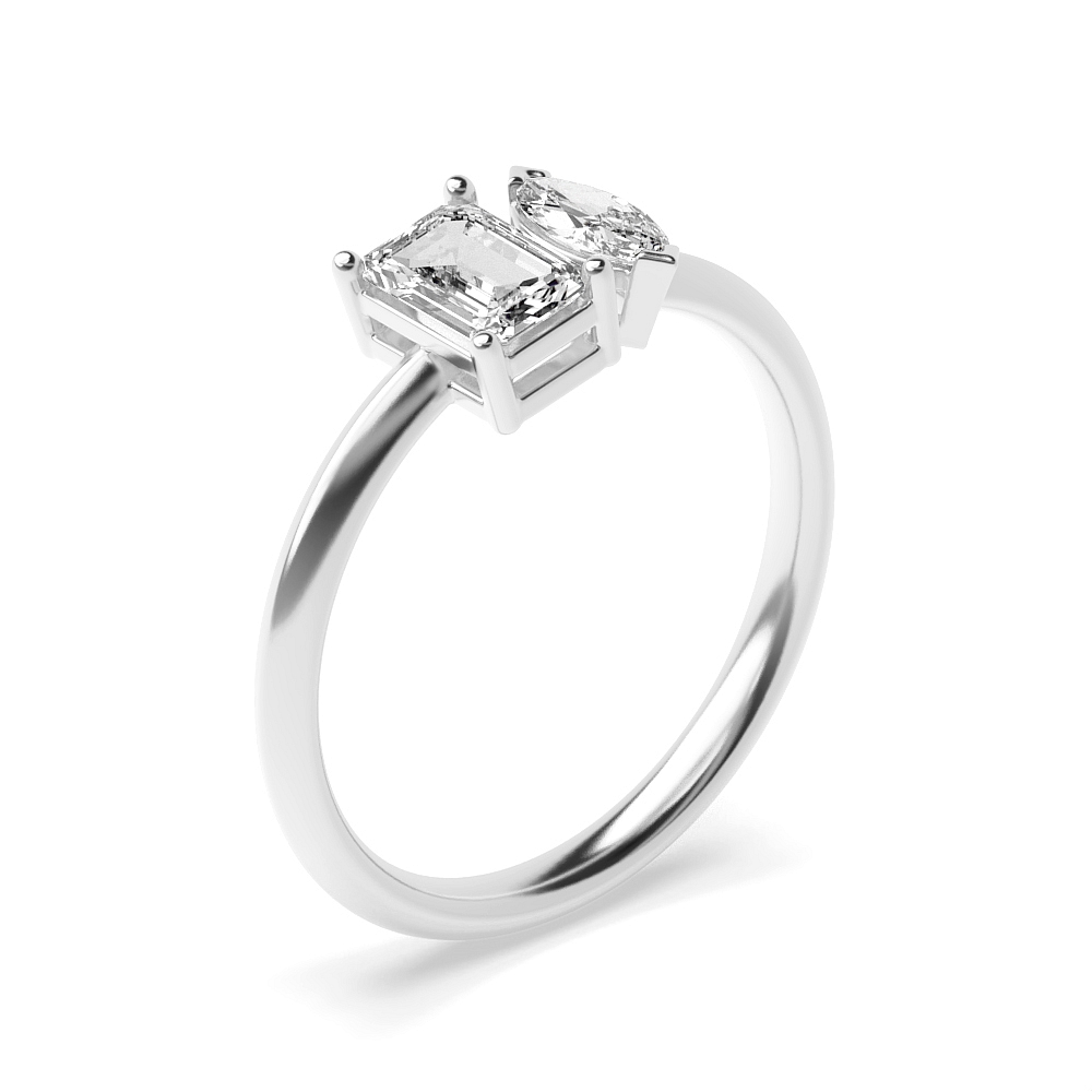 prong setting emerald and marquise shape two stone ring
