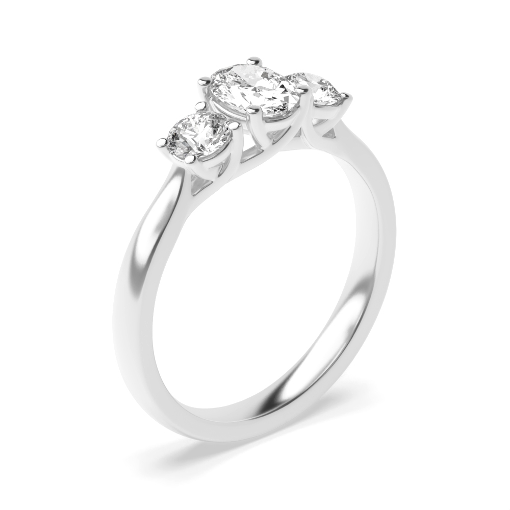 prong setting oval and round trilogy diamond engagement ring
