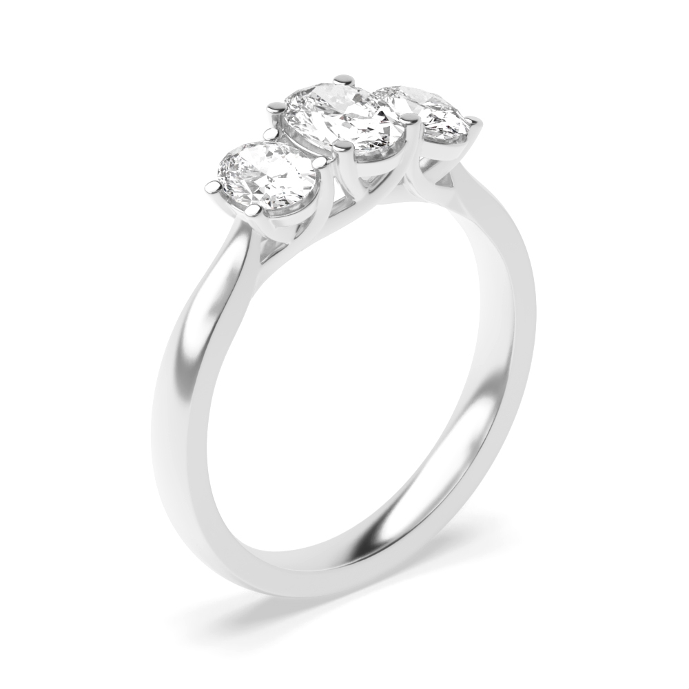 4 prong setting oval trilogy diamond engagement ring
