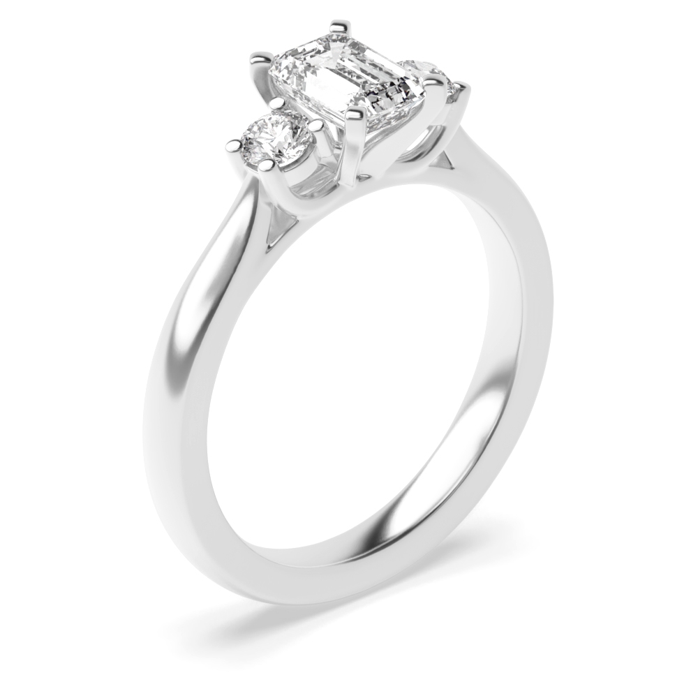 unique emerald and round cut diamond trilogy engagement rings for women