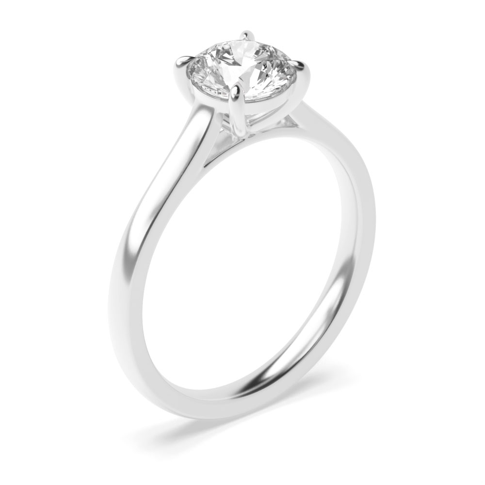 4 prong set accentuates the brilliance of the round shaped diamond classic solitaire ring